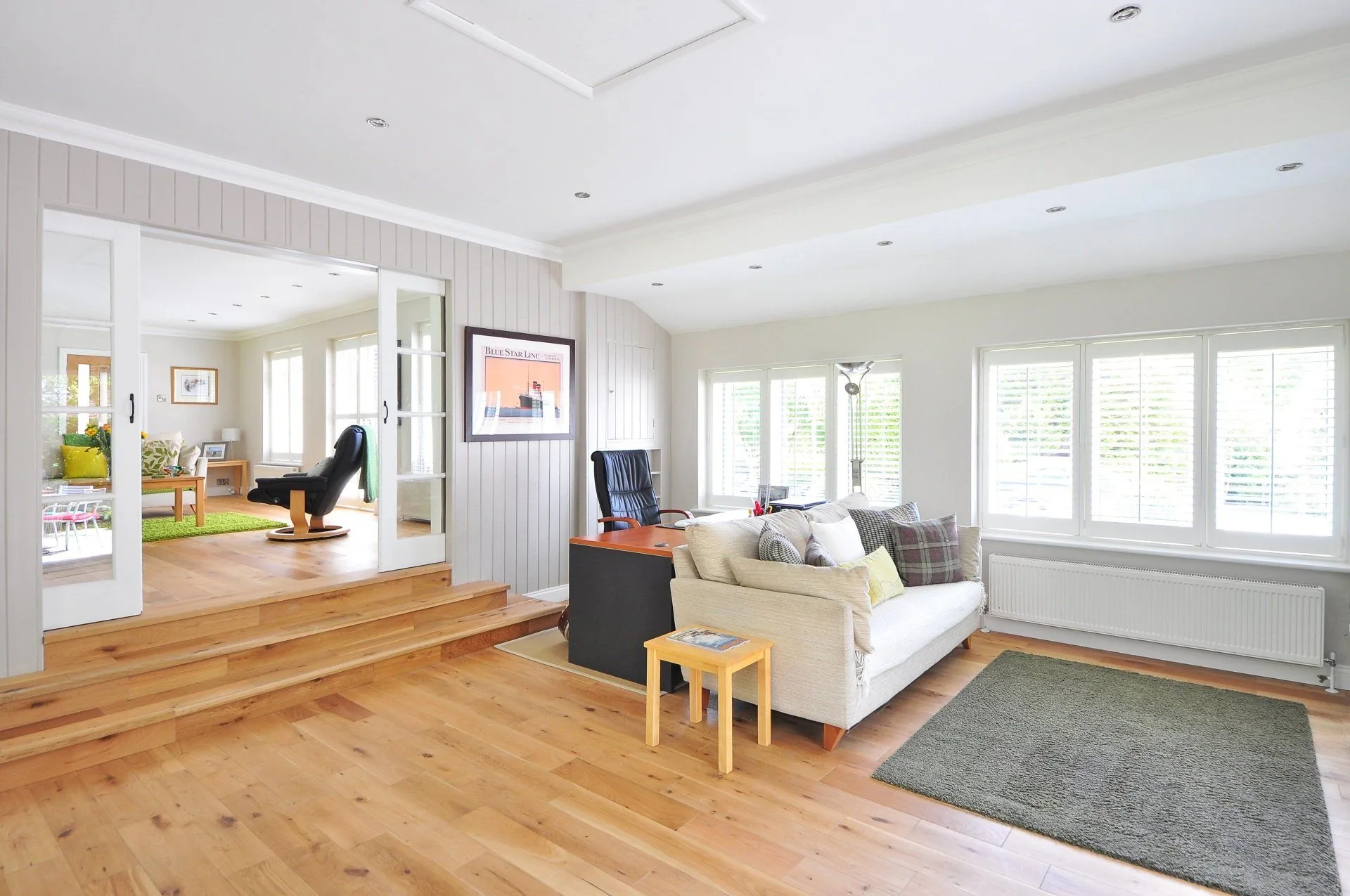 Sanded oak floor partway through a refinishing job