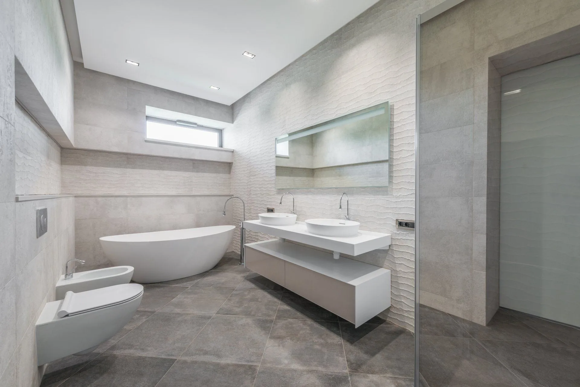 Detail of straight grout lines on a freshly set tile wall
